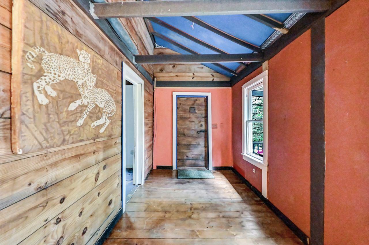 2285 Bear Town Road Canadensis, PA 18325 - Photo 9 of 58 a view of a porch with wooden floor and a shower