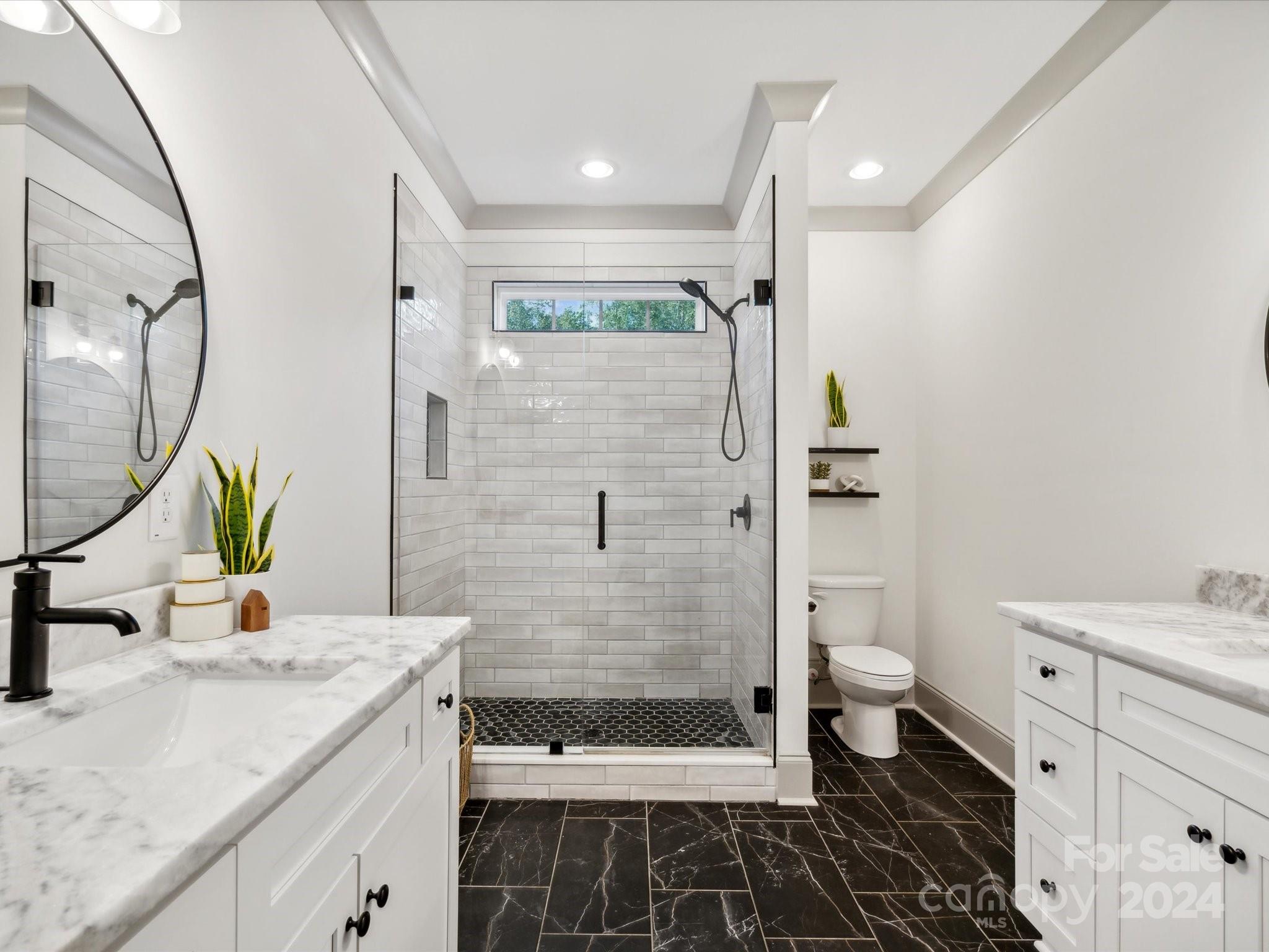 246 East Rambo Road Rock Hill, SC 29730 - Photo 21 of 48 a bathroom with a sink toilet and shower