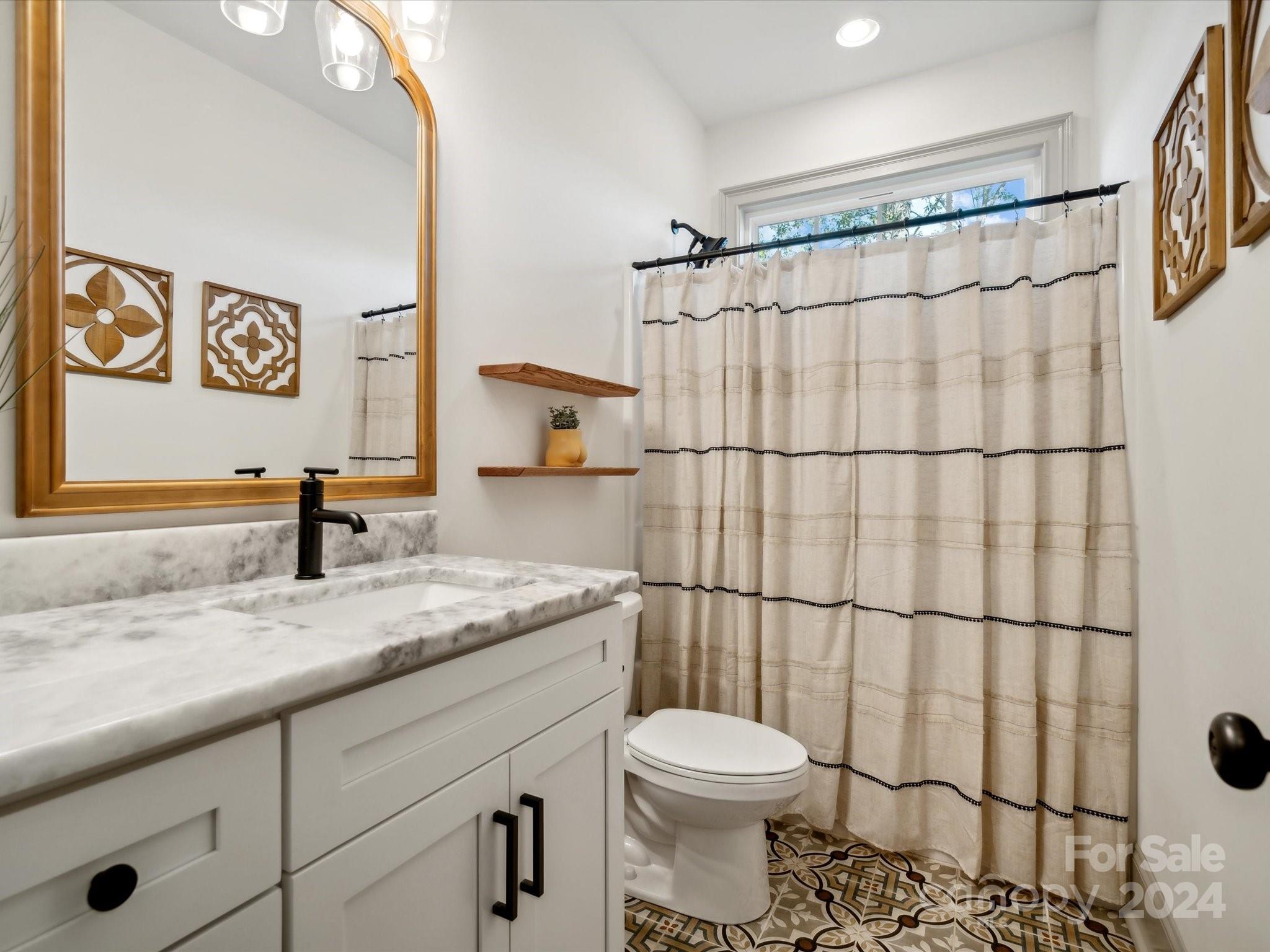 246 East Rambo Road Rock Hill, SC 29730 - Photo 24 of 48 a bathroom with a granite countertop sink toilet and shower