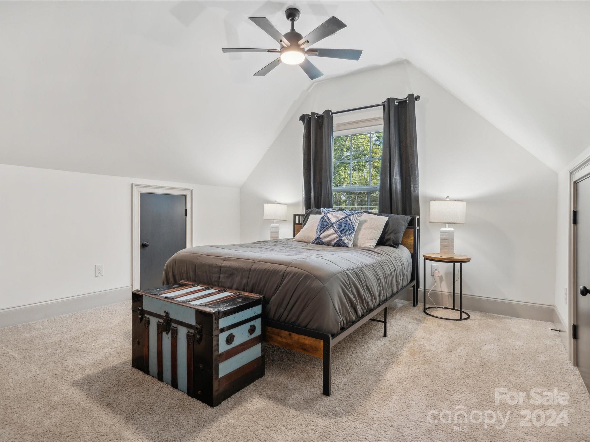 246 East Rambo Road Rock Hill, SC 29730 - Photo 29 of 48 a spacious bedroom with a bed and a window