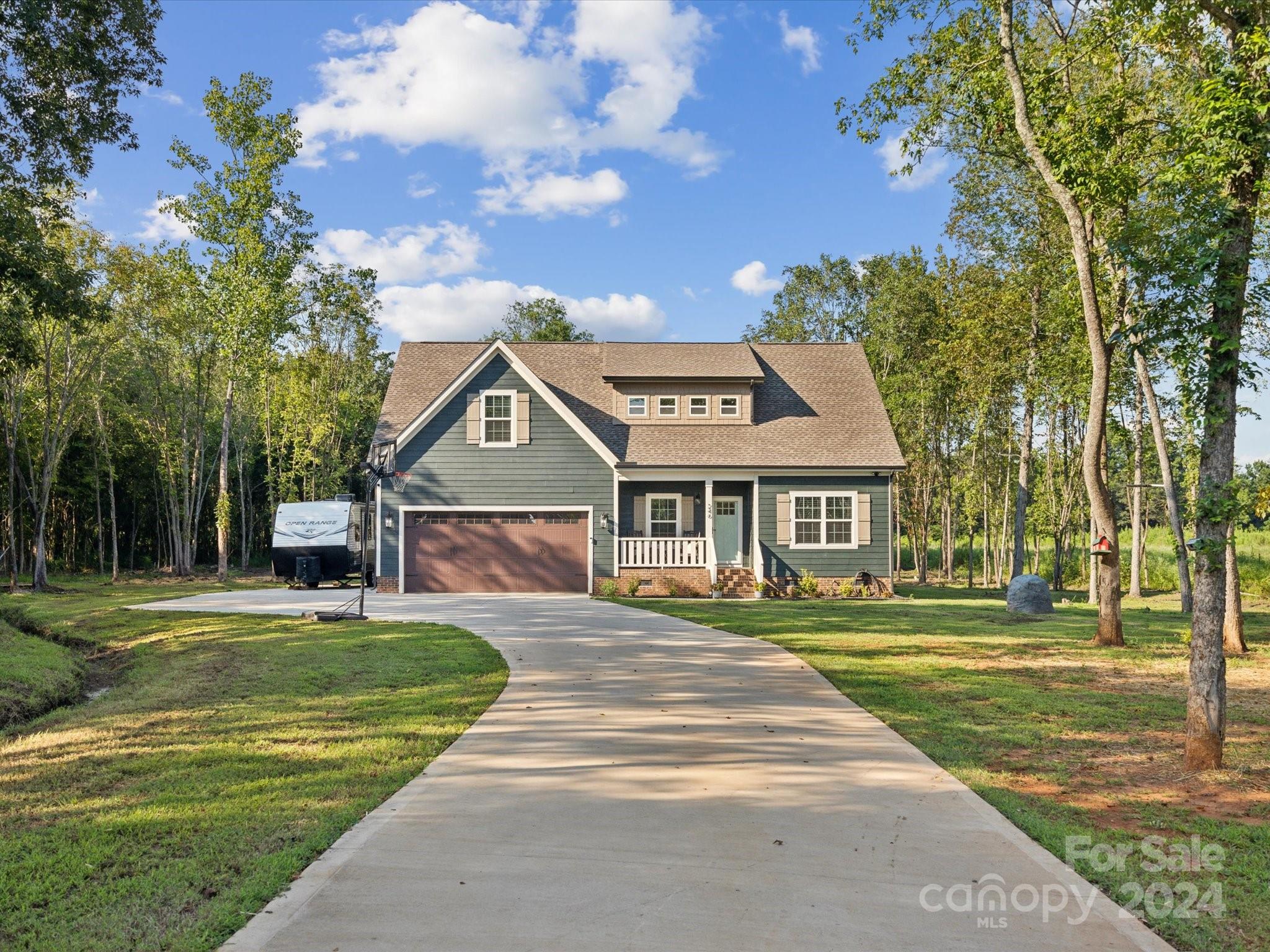 246 East Rambo Road Rock Hill, SC 29730 - Photo 3 of 48 a front view of a house with a yard