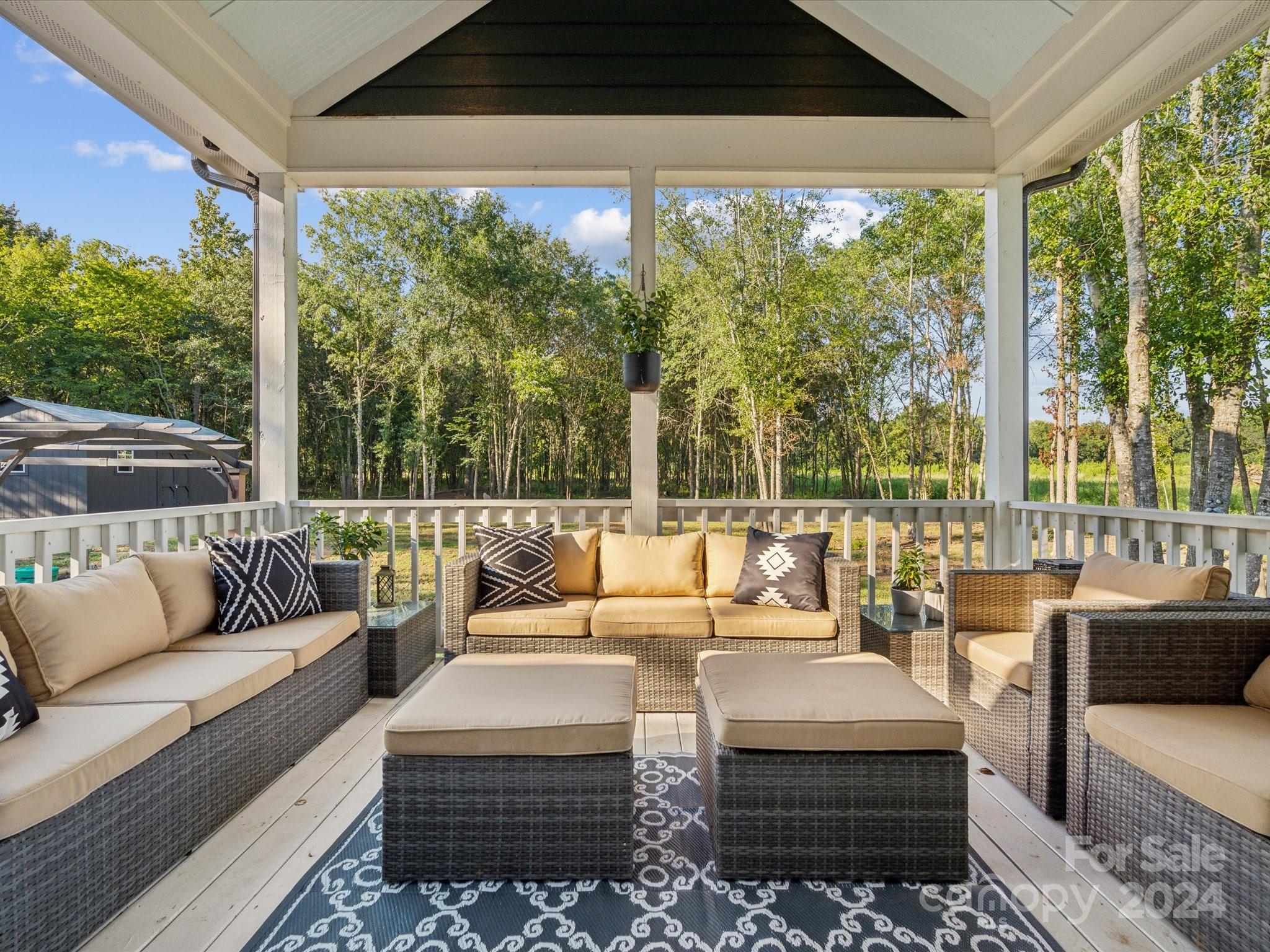 246 East Rambo Road Rock Hill, SC 29730 - Photo 35 of 48 a balcony with couch and outdoor view
