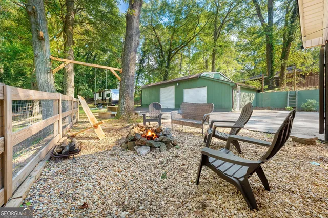a view of a patio with a table chairs and a patio view
