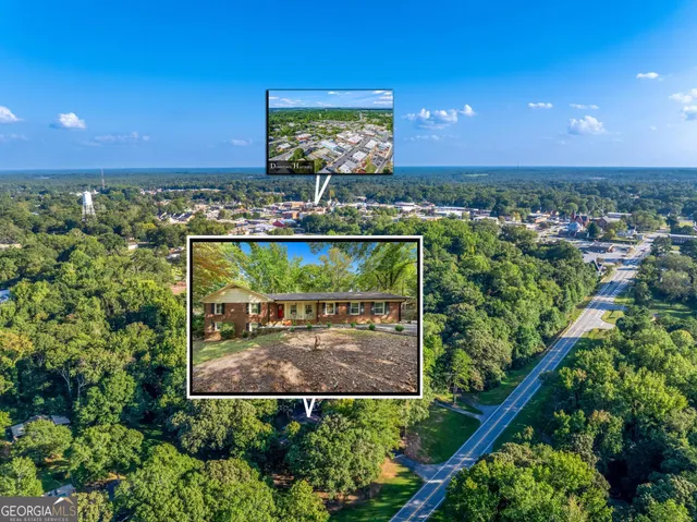 a sign that is sitting on a shelf in the middle of a yard