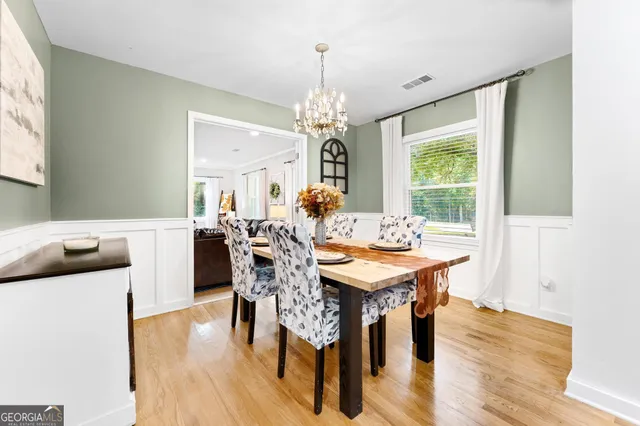 a kitchen with granite countertop a sink and a stove