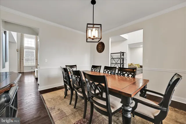 a living room with furniture fireplace and flat screen tv