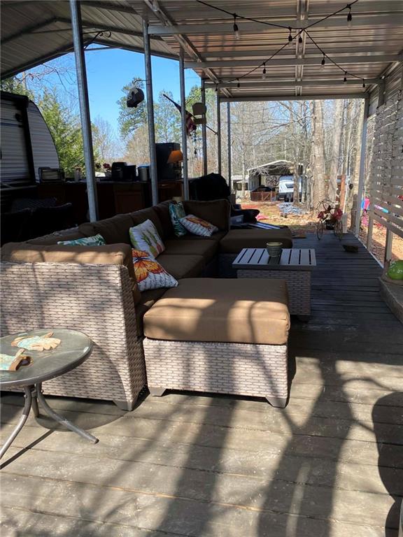 227 Peaceful Loop Chatsworth, GA 30705 - Photo 3 of 16 a living room with furniture