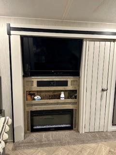 227 Peaceful Loop Chatsworth, GA 30705 - Photo 6 of 16 a living room with a stove and a microwave