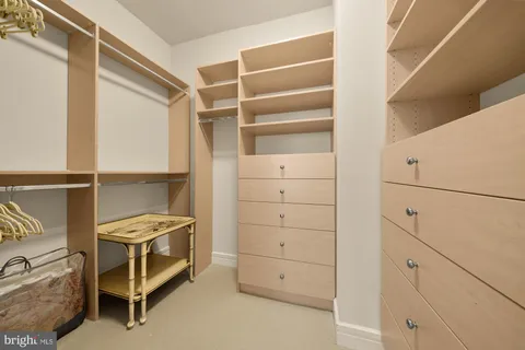 a view of an empty walk in closet