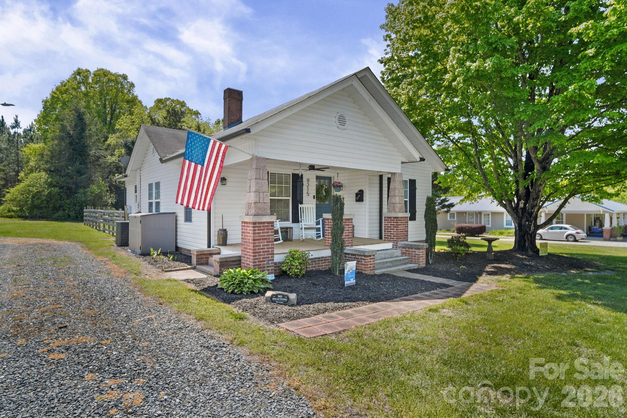 9215 Stokes Ferry Road Salisbury, NC 28146 - Photo 22 of 22 a front view of a house with garden