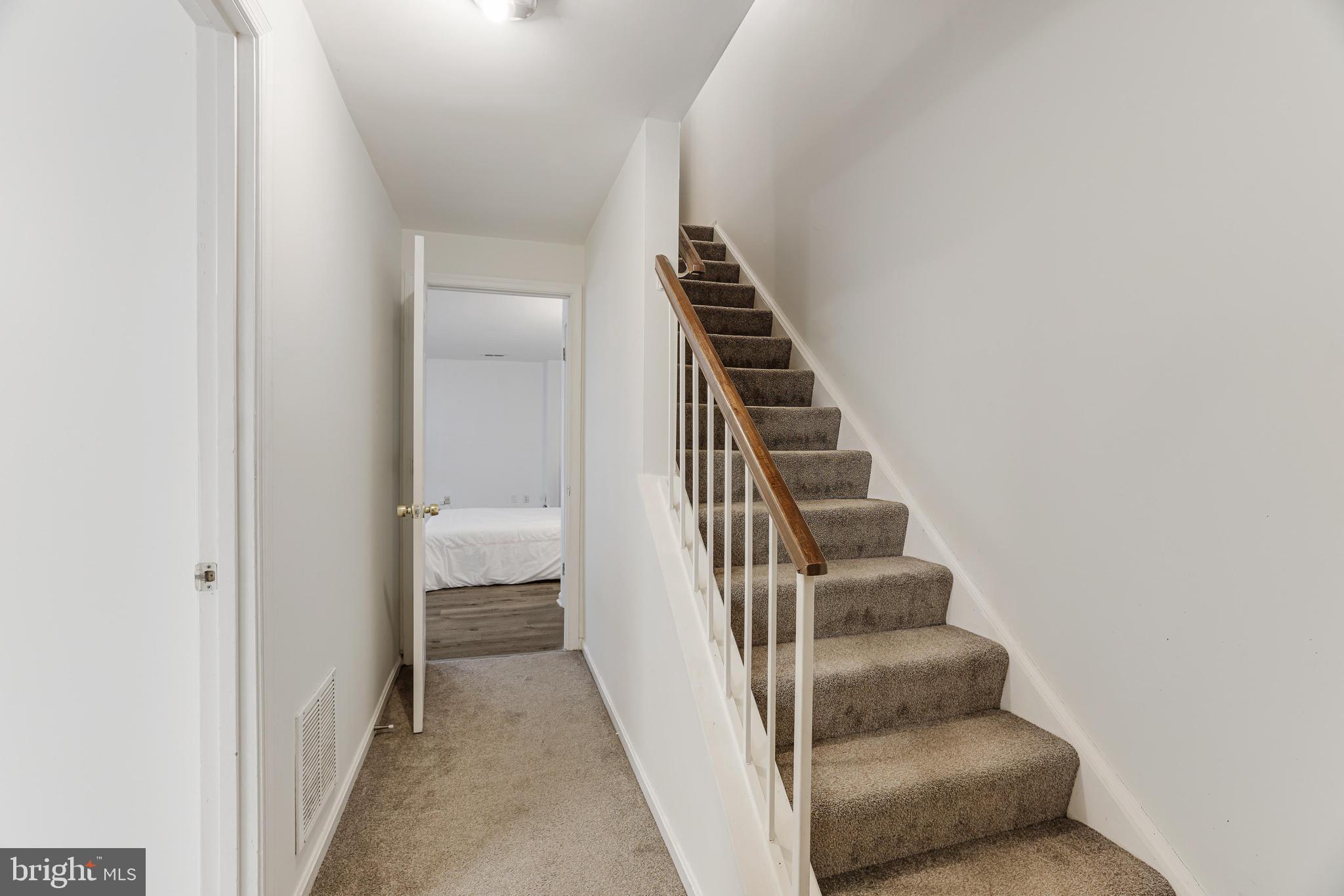 8813 Winding Hollow Way Springfield, VA 22152 - Photo 18 of 29 a view of a hallway with entryway