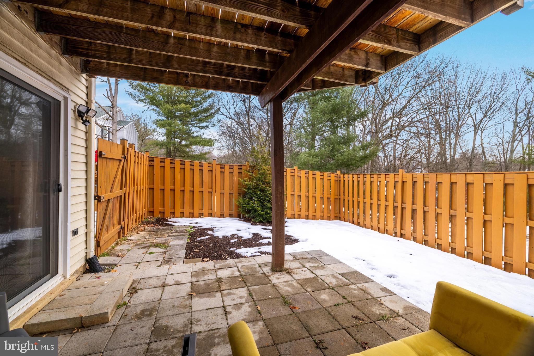 8813 Winding Hollow Way Springfield, VA 22152 - Photo 27 of 29 a view of backyard with wooden fence