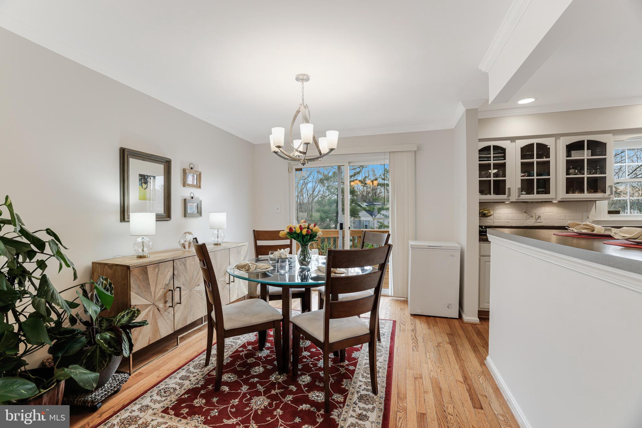 8813 Winding Hollow Way Springfield, VA 22152 - Photo 8 of 29 a dining room with furniture and window