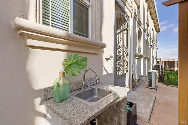 a view of an entryway with wooden floor