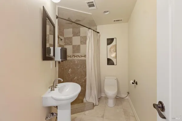 a view of a balcony with an outdoor space