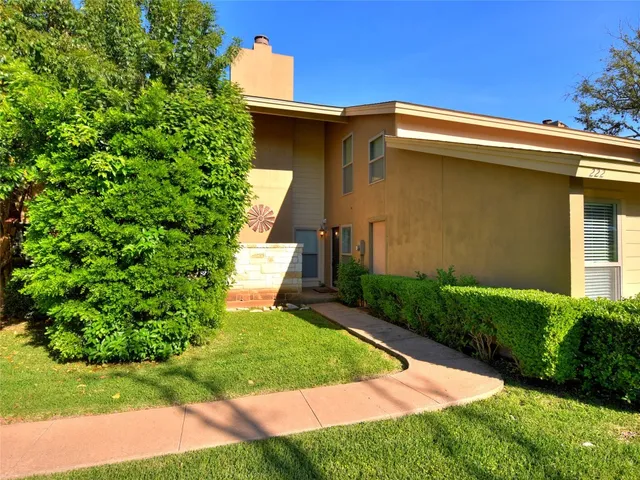 a view of a back yard of the house