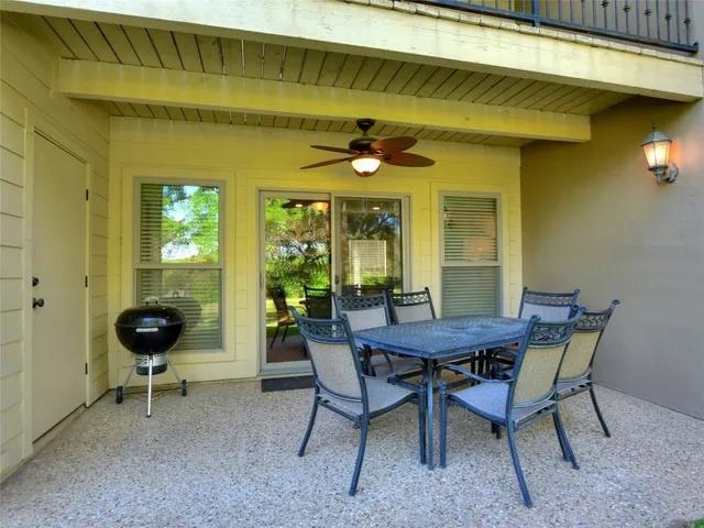 a view of a park with large trees