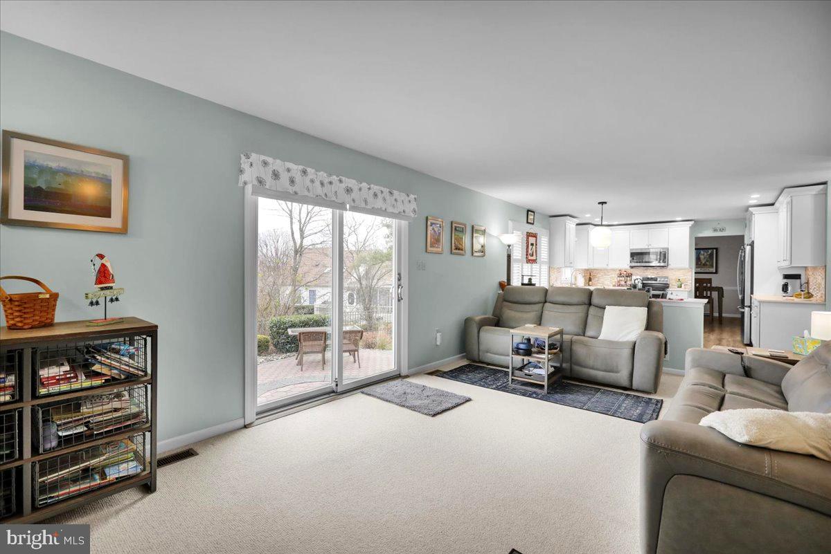 1102 Pepper Ridge Drive Reading, PA 19606 - Photo 12 of 33 a living room with furniture and a book shelf