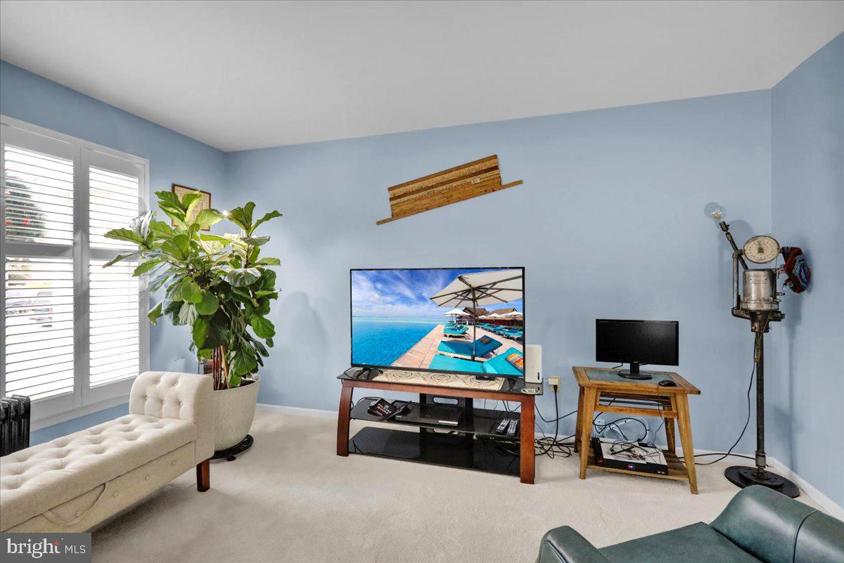 1102 Pepper Ridge Drive Reading, PA 19606 - Photo 14 of 33 a living room with furniture and a flat screen tv