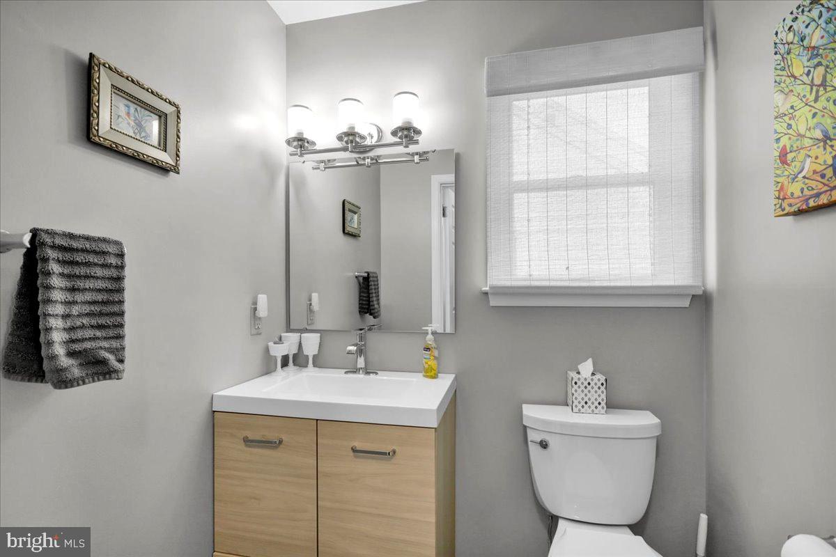 1102 Pepper Ridge Drive Reading, PA 19606 - Photo 16 of 33 a bathroom with a sink a toilet and mirror