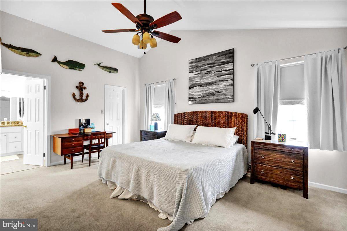 1102 Pepper Ridge Drive Reading, PA 19606 - Photo 17 of 33 a bedroom with a bed and a chandelier