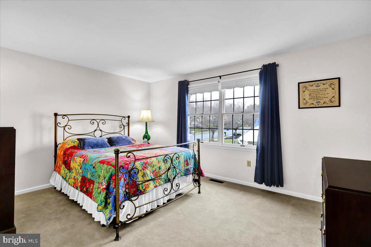1102 Pepper Ridge Drive Reading, PA 19606 - Photo 21 of 33 a bedroom with a bed and window