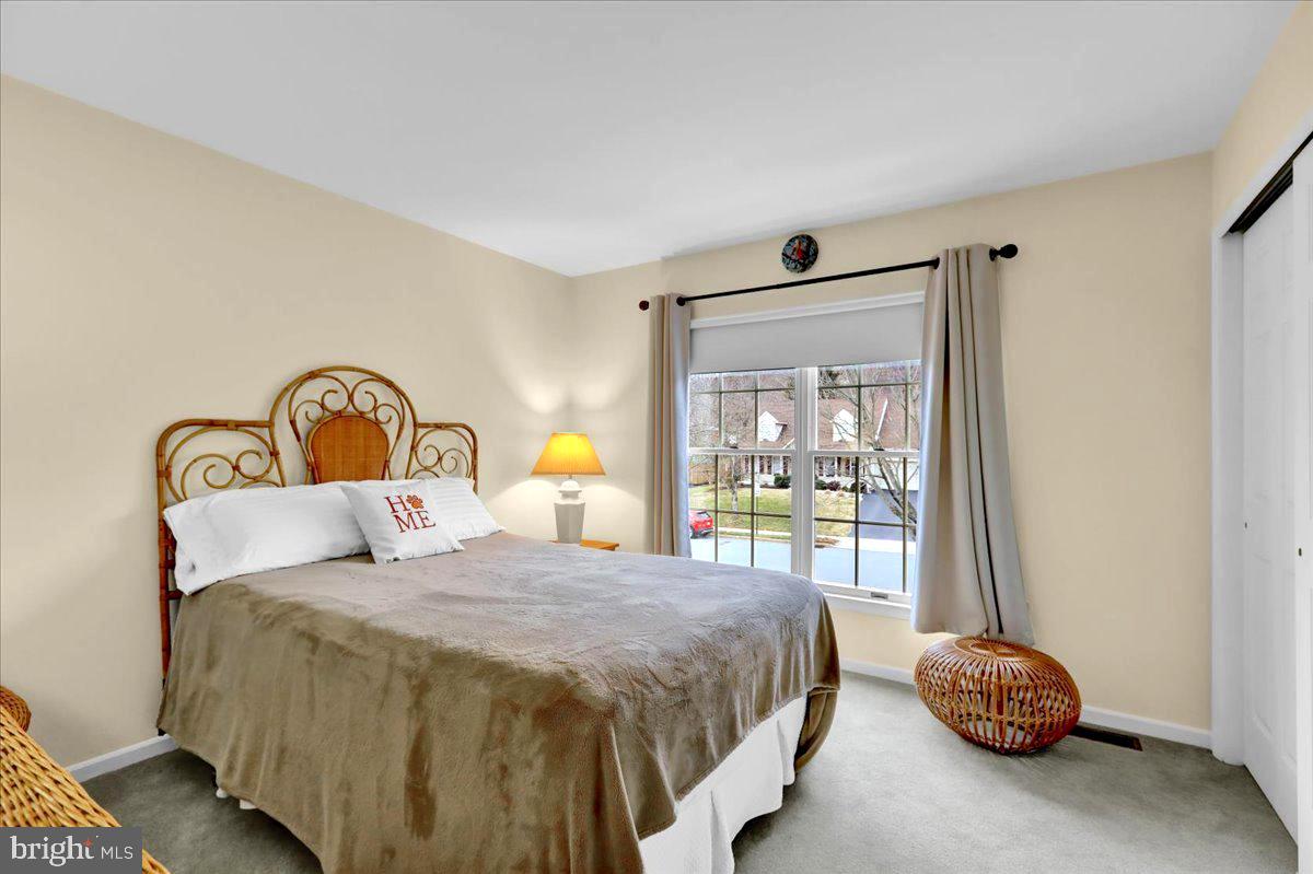 1102 Pepper Ridge Drive Reading, PA 19606 - Photo 22 of 33 a bedroom with a bed and a large window