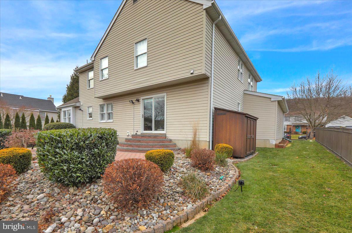 1102 Pepper Ridge Drive Reading, PA 19606 - Photo 32 of 33 a front view of a house with garden
