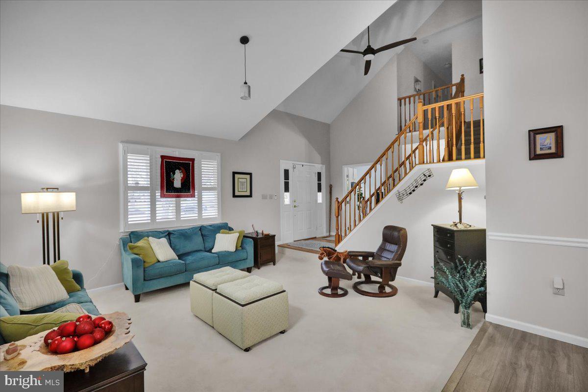 1102 Pepper Ridge Drive Reading, PA 19606 - Photo 5 of 33 a living room with furniture and a chandelier