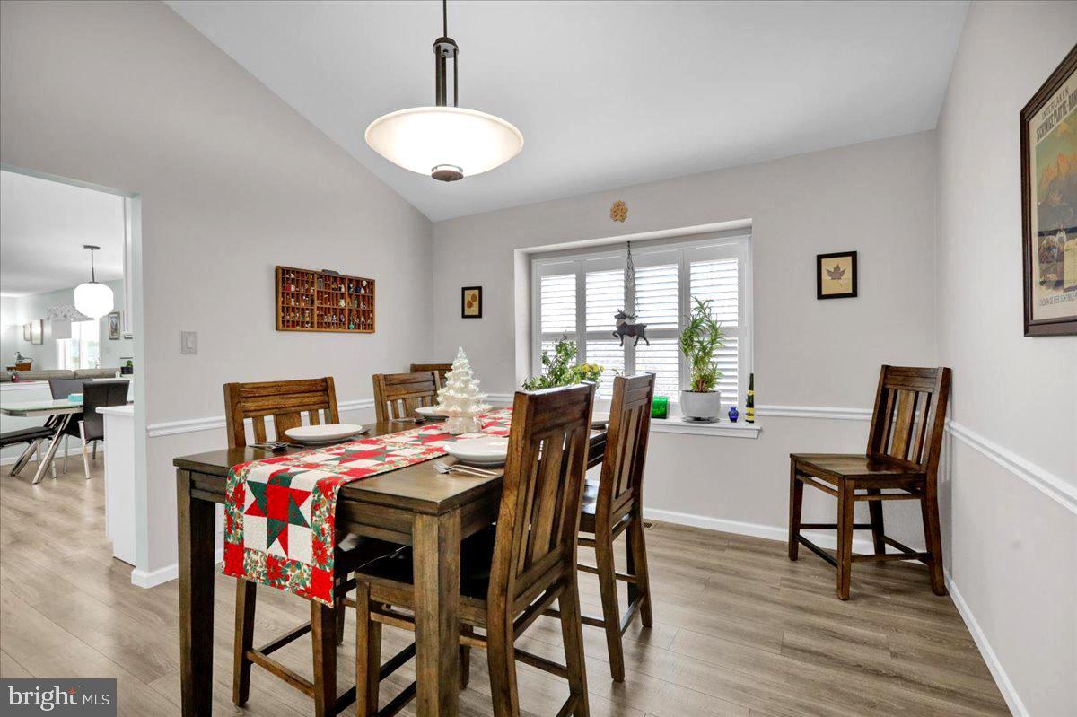 1102 Pepper Ridge Drive Reading, PA 19606 - Photo 10 of 33 a view of a dining room with furniture and wooden floor