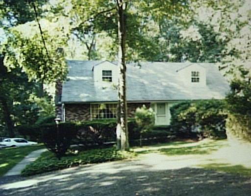 72 Rolling Ridge Road Stamford, CT 06903 - Photo 1 of 1 front view of a house with a yard