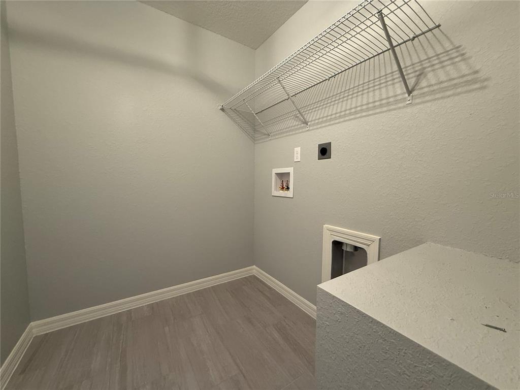 2460 Northwest Buena Vista Road Dunnellon, FL 34431 - Photo 8 of 14 a view of a refrigerator in kitchen