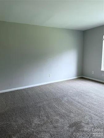 an empty room and window