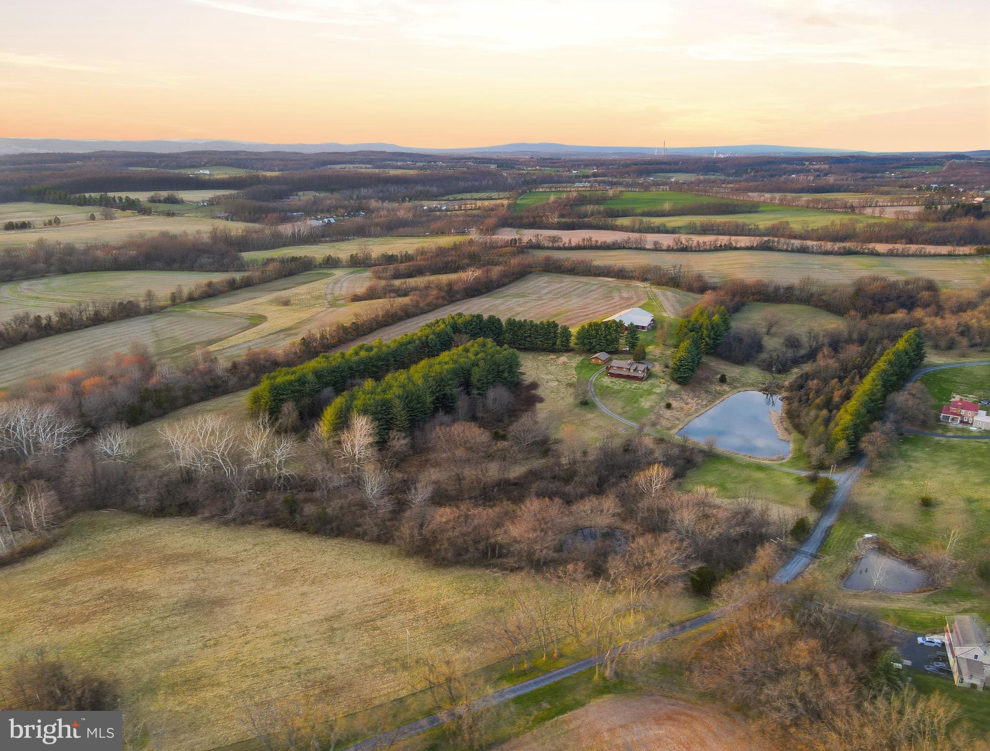 21142 Westerly Road Poolesville, MD 20837 - Photo 64 of 76 a view of an outdoor space and mountain view
