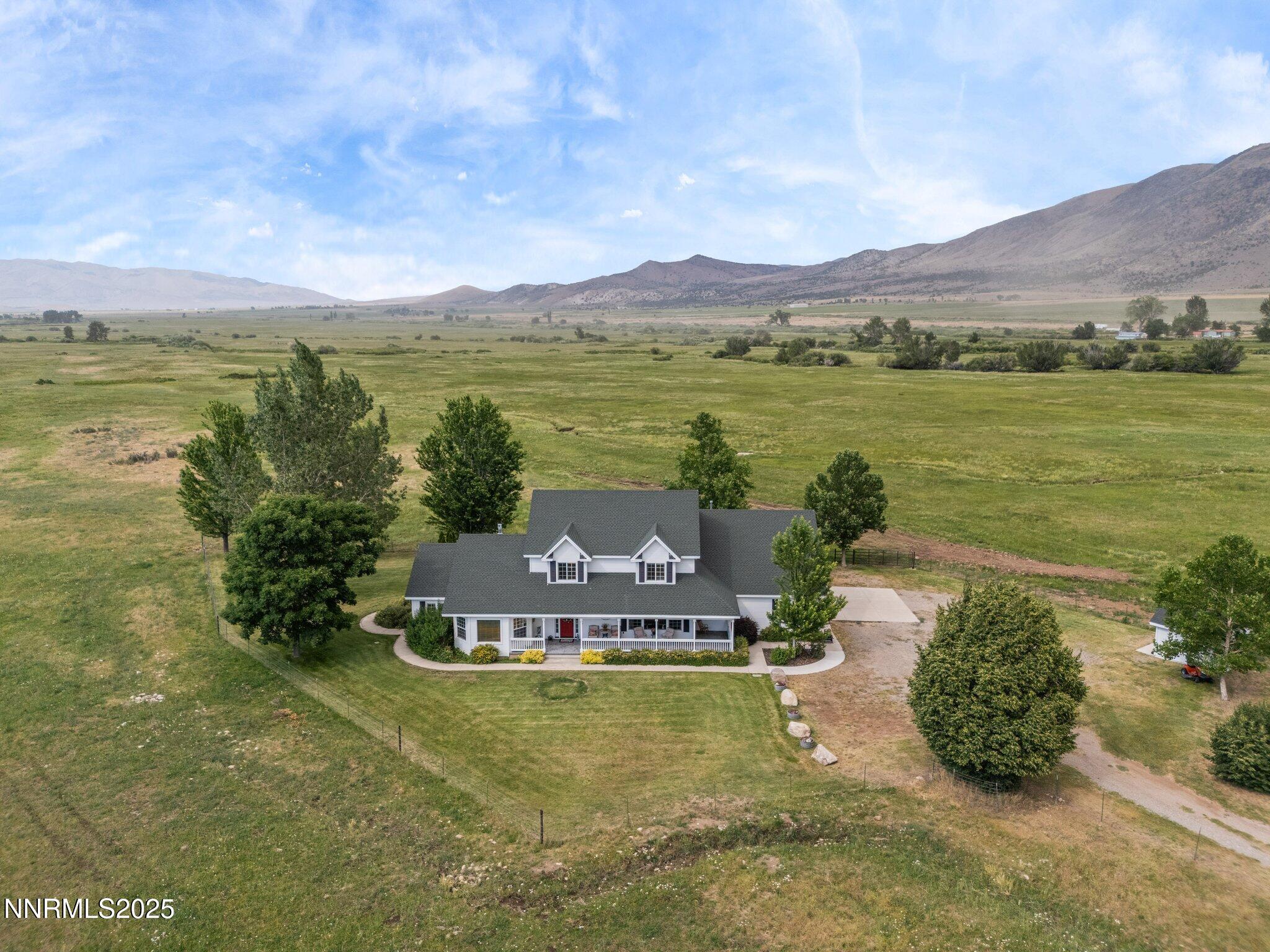 801 Larson Lane Coleville, CA 96107 - Photo 32 of 37 a view of a lake with a mountain in the background