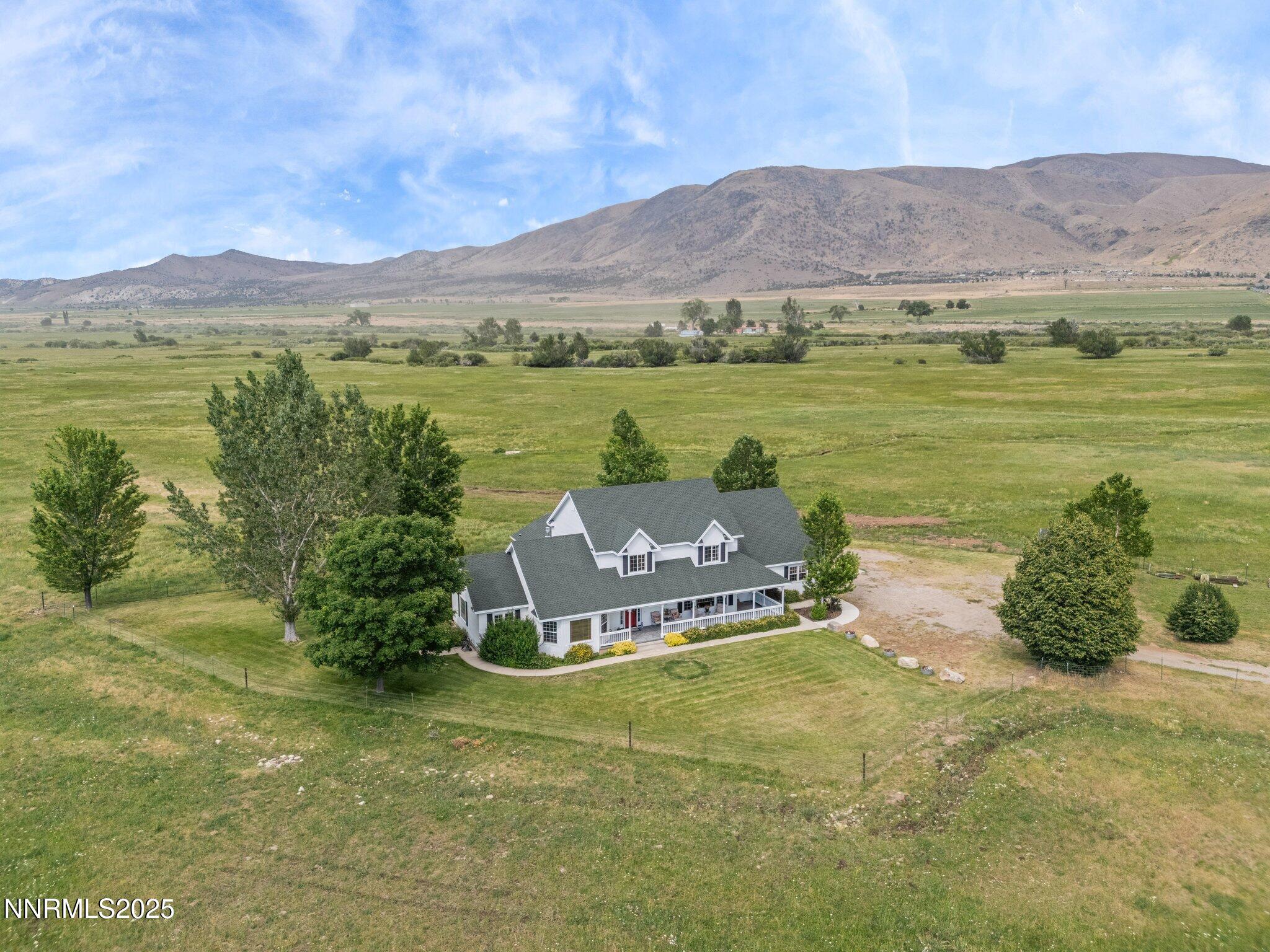 801 Larson Lane Coleville, CA 96107 - Photo 33 of 37 a view of a lake with a mountain in the background