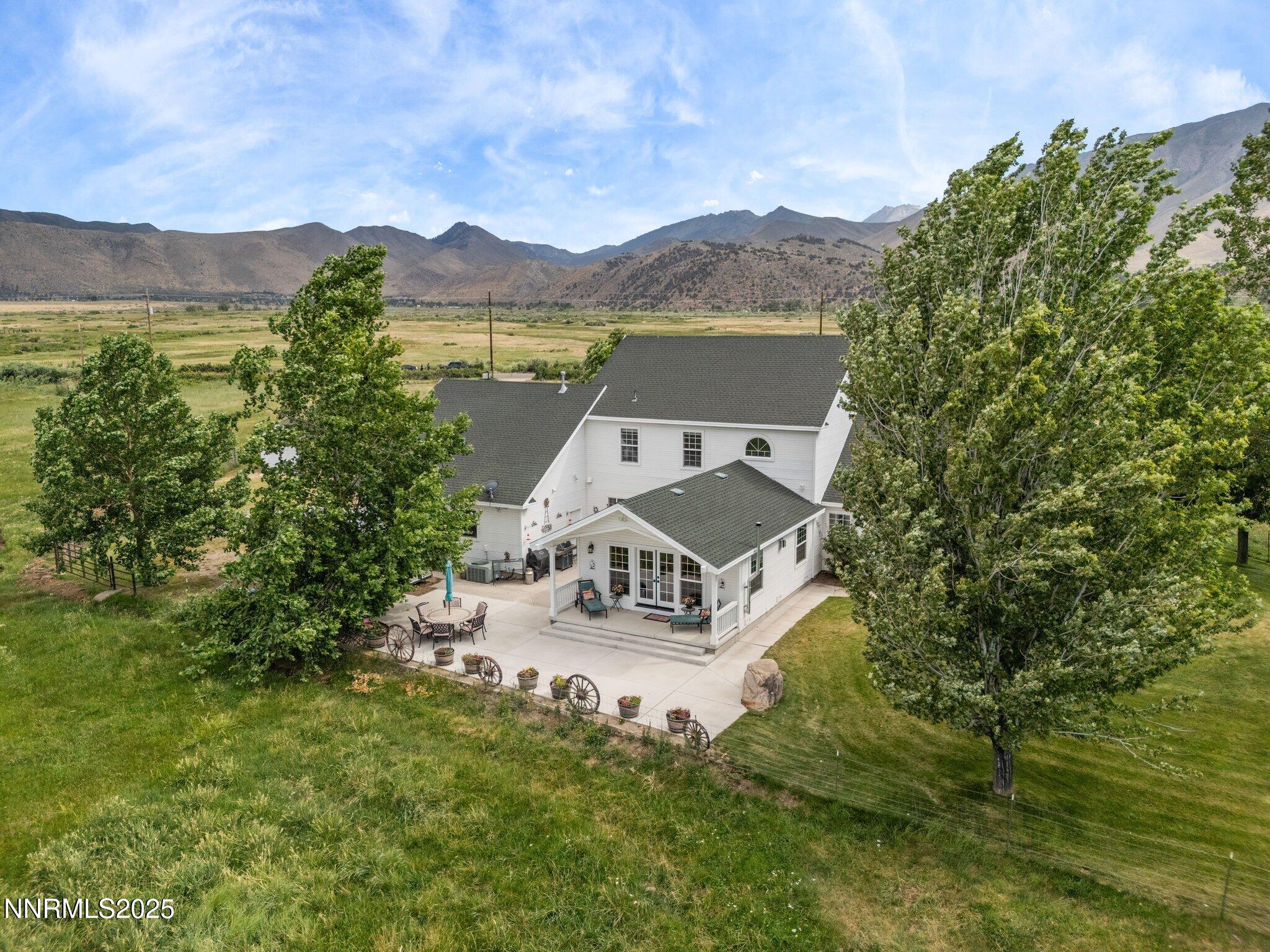 801 Larson Lane Coleville, CA 96107 - Photo 35 of 37 a view of a house with a mountain in the background