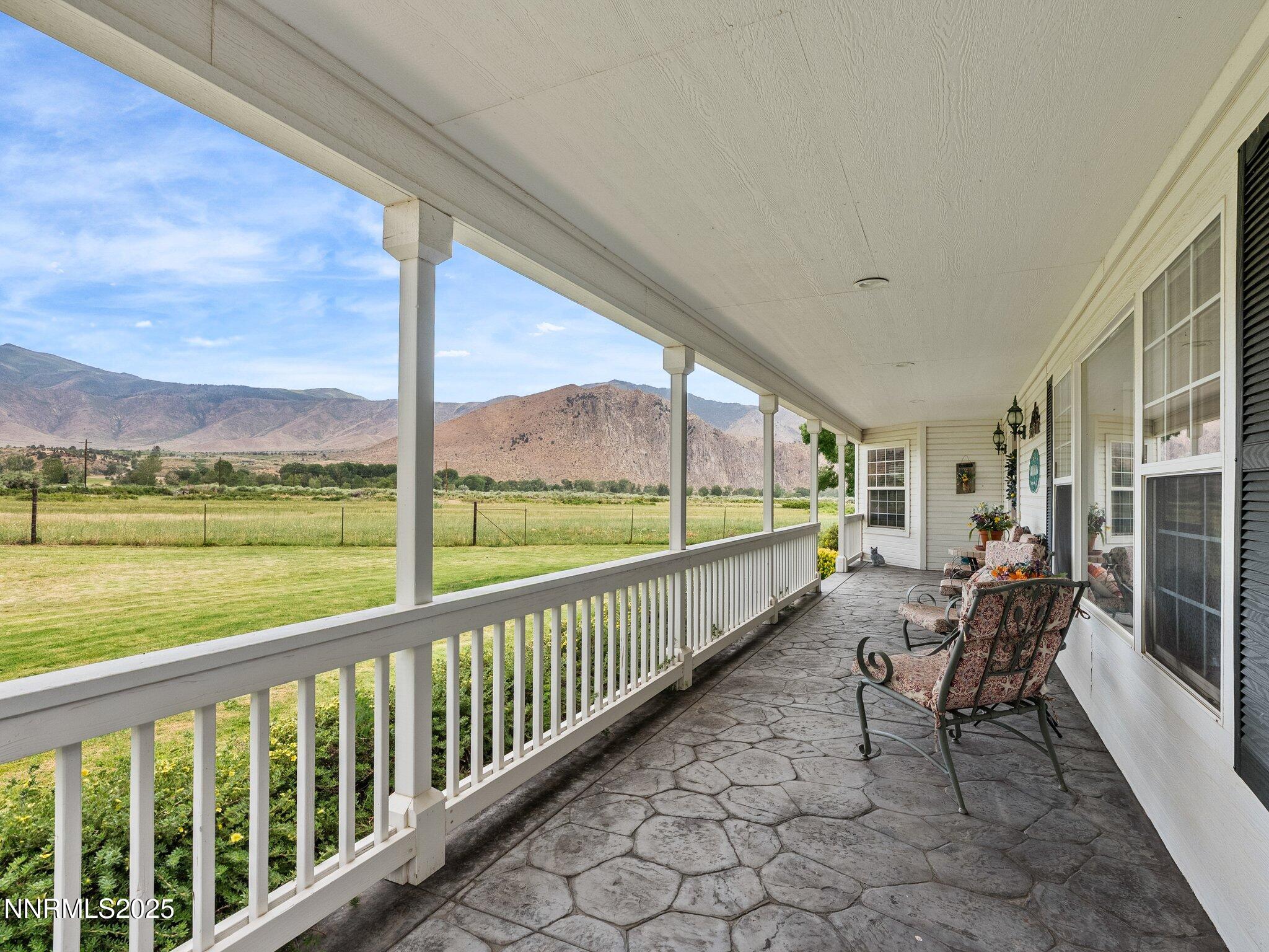 801 Larson Lane Coleville, CA 96107 - Photo 6 of 37 a view of two chairs in the balcony next to a yard