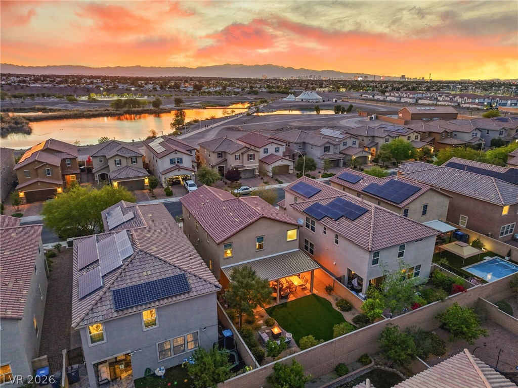 150 Fulgora Street Henderson, NV 89074 - Photo 5 of 92 Aerial view at dusk of Cornerstone Park featuring aerial view of property & backyard.