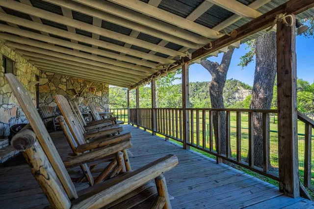 a backyard of a house with lots of trees
