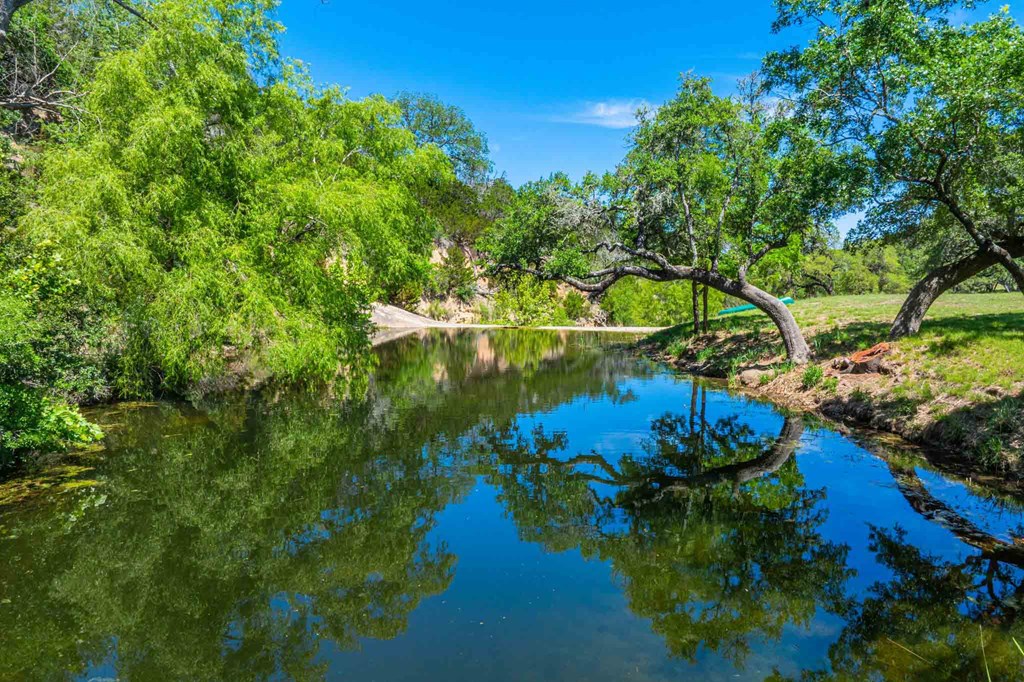 161 East Flach Road Comfort, TX 78013 - Photo 7 of 91 a view of a lake with a tree