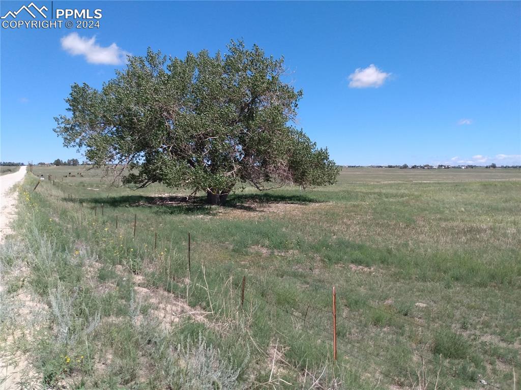 10975 McClelland Road Calhan, CO 80808 - Photo 9 of 32 a view of a lake with a yard