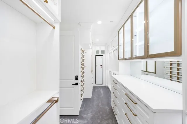 a bathroom with a sink a mirror and a shower