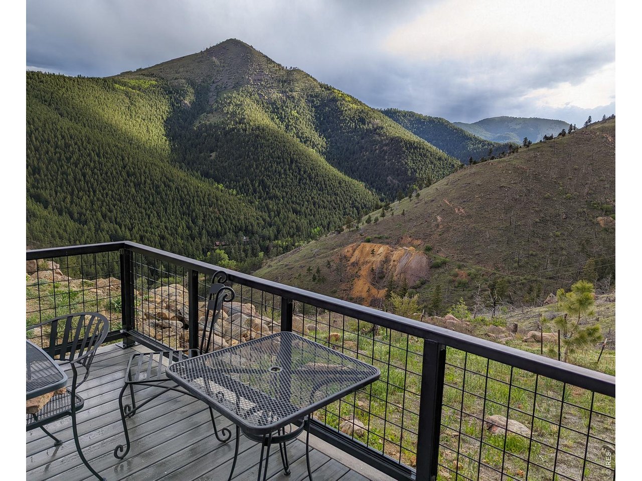 560 Emerson Gulch Road Boulder, CO 80302 - Photo 3 of 32 Perched in front of Sugarloaf mountain