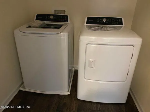 a utility room with dryer and washer