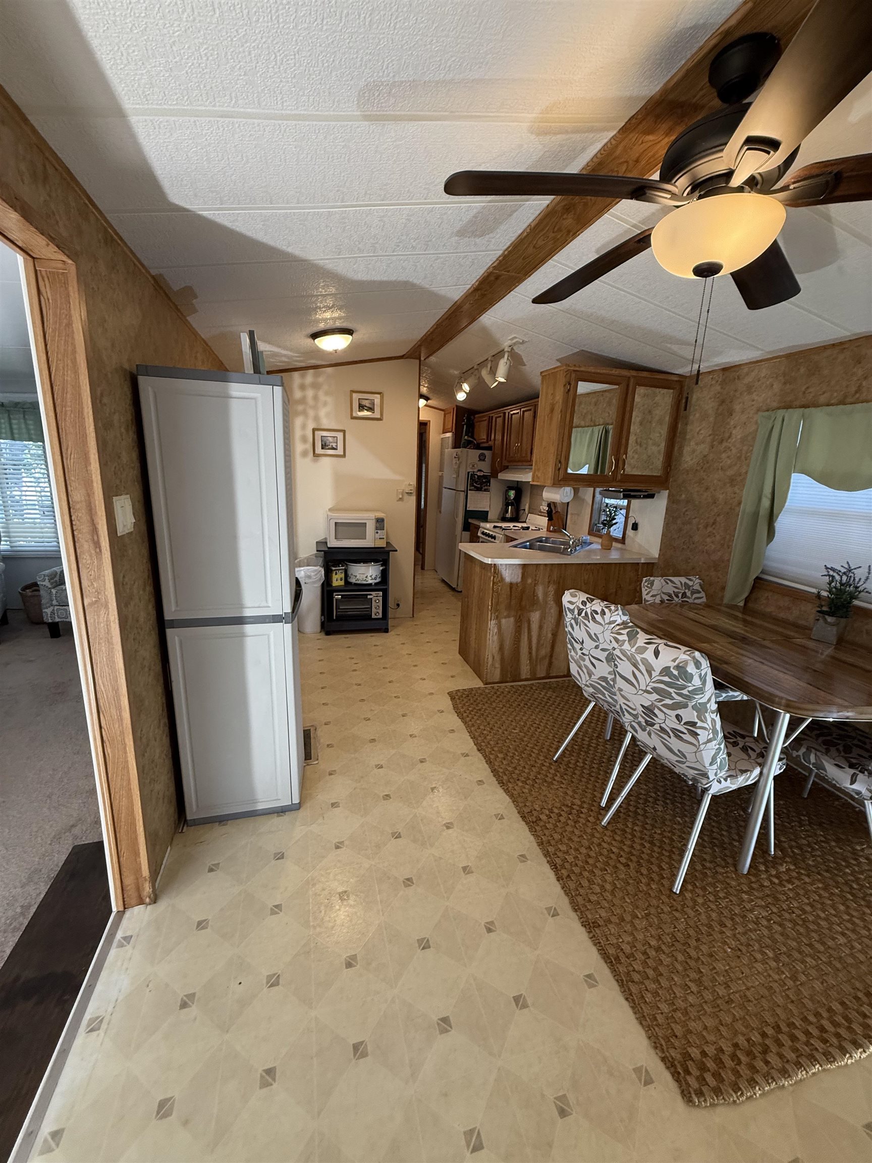 3066 Highway 9 Ocean View, NJ 08230 - Photo 8 of 22 a kitchen with stainless steel appliances granite countertop a refrigerator and a stove top oven