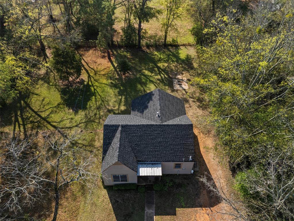 204 Jones Street Longview, TX 75602 - Photo 15 of 38 a view of house with a tree