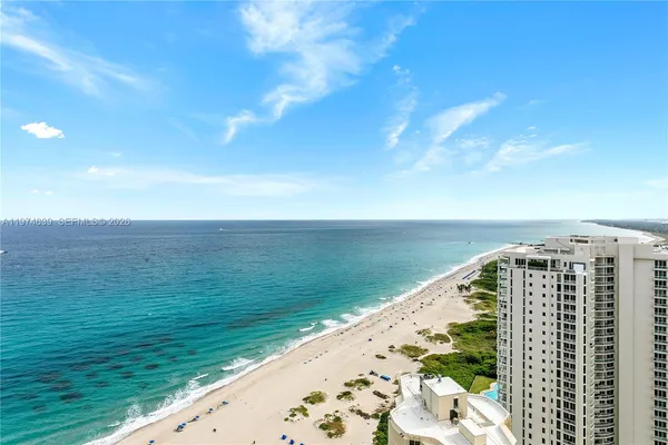 a view of building with ocean view