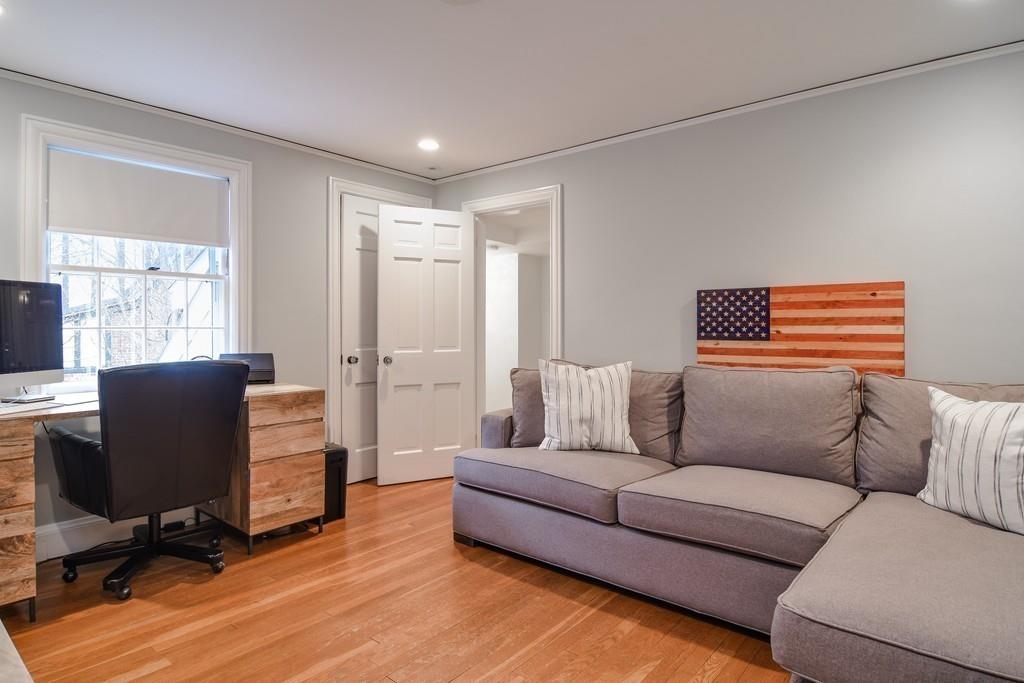 8 Fiske Road Wellesley, MA 02481 - Photo 14 of 21 a living room with furniture and a wooden floor