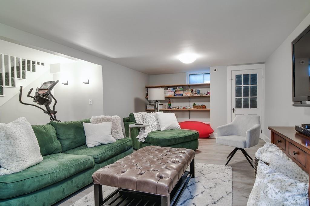8 Fiske Road Wellesley, MA 02481 - Photo 15 of 21 a living room with furniture and wooden floor